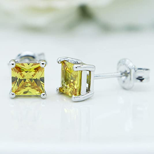 created Citrine Silver, Sterling Silver stud earring s for women.