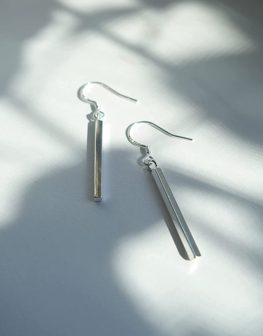Skinny silver Bars. About 1.80 CM with out hook. Hook Closure with 925 mark stamp. Made of 925 Sterling Silver. Hypoallergenic. Trendy Sterling Silver Earrings. Dainty, Light Weight, Dangling Earring